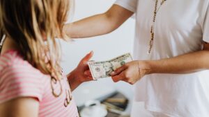 kids holding money